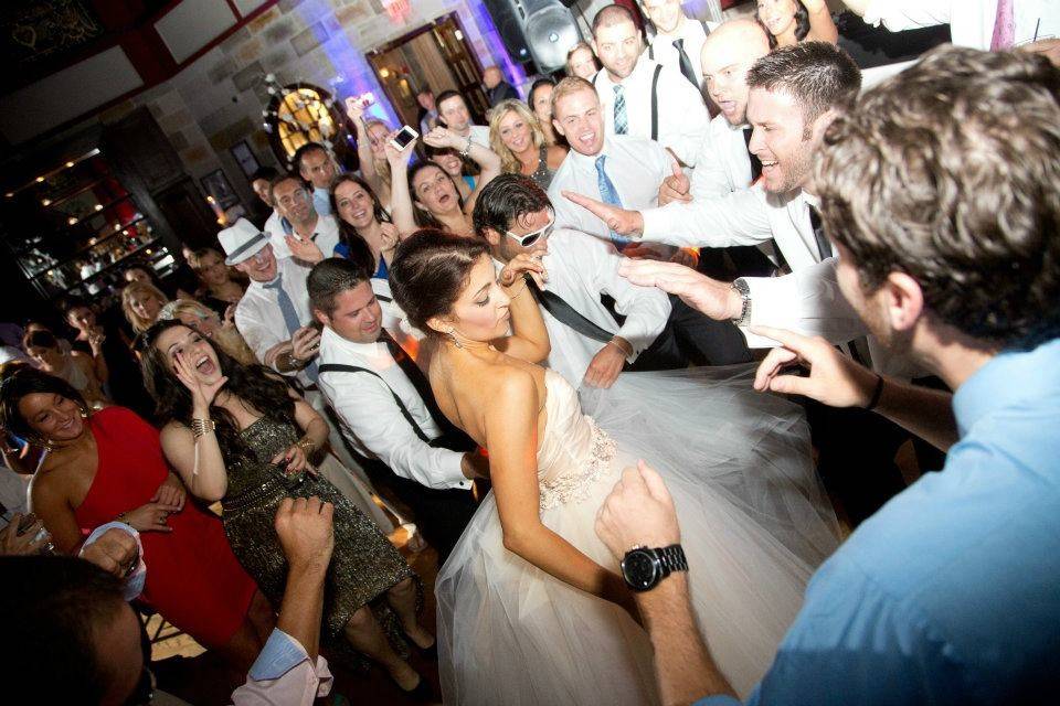 Couple dancing with the guests