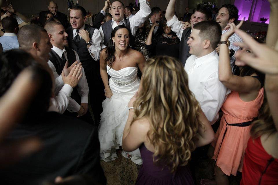 Couple dancing with the guests