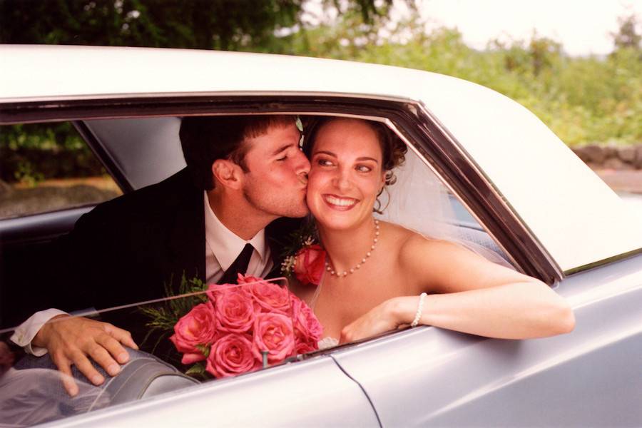 Romance in a classic car, outside of Seattle, Washington.