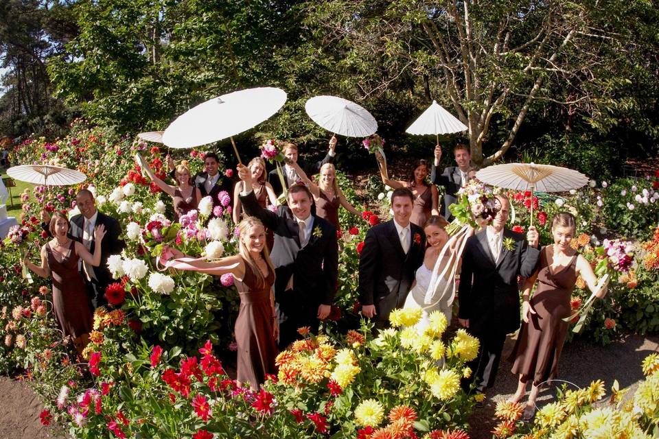 The wedding party celebrating in the Dahlia Garden at the Mendocino Coast Botanical Garden, in Fort Bragg, California.