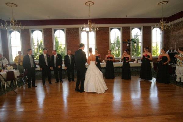 The couple with the bridesmaids and groomsmen