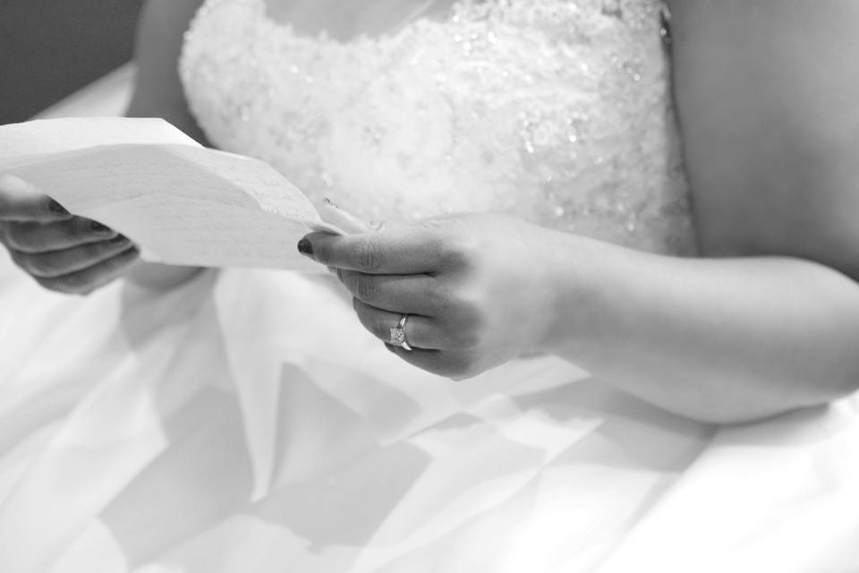 Bride reading letter