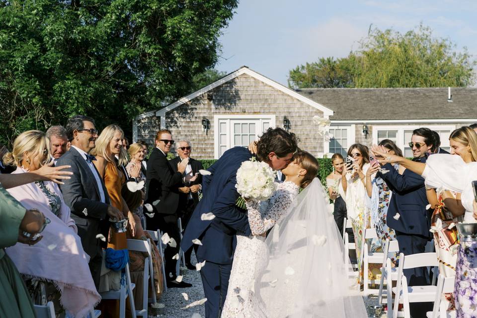 Bride and groom kiss