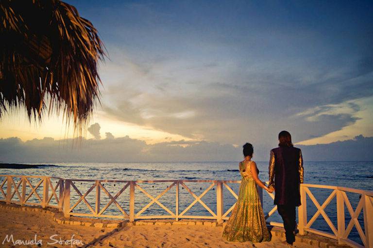 Newlyweds overlooking the sea