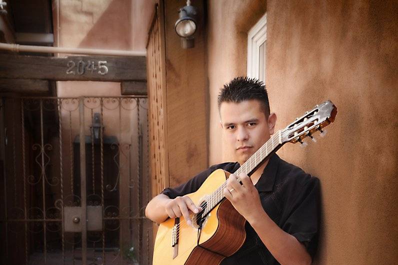 Pose with the guitar