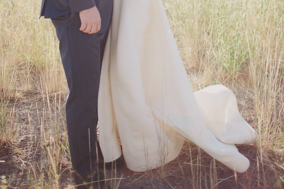 Field shot bride and groom