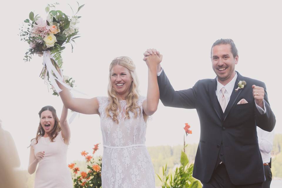 Hands up cheers bride and groo