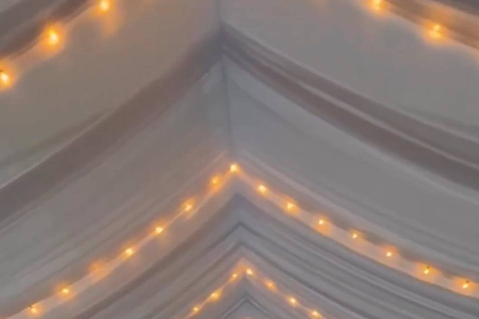 Tent with draping + lighting