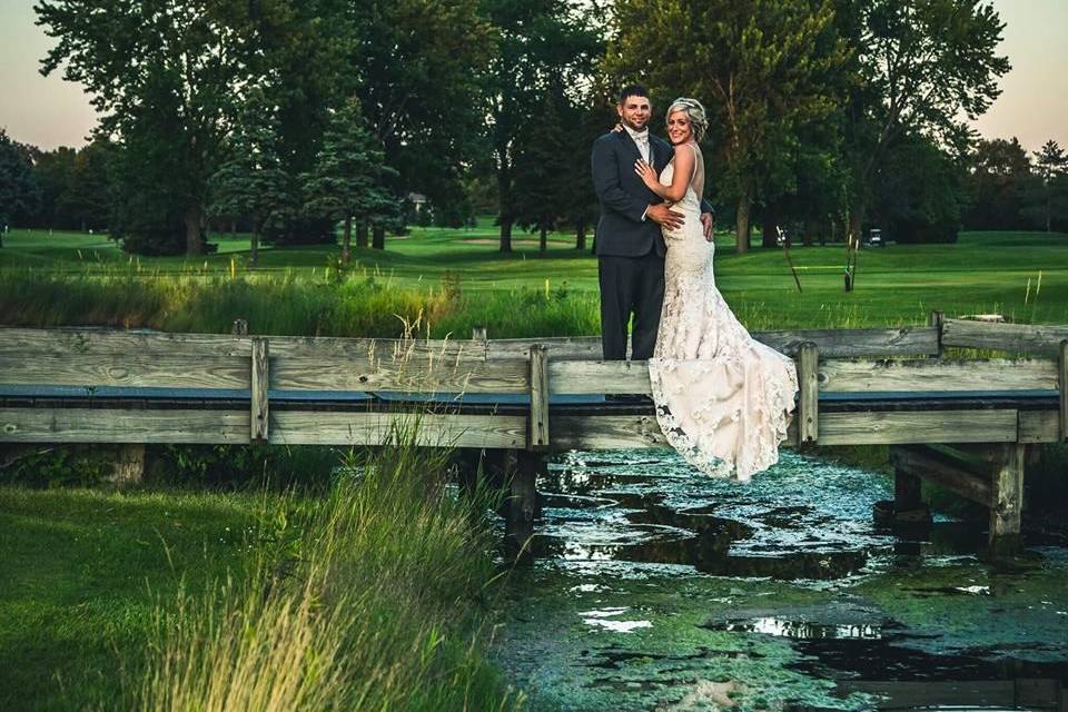 Couple on the wooden bridge