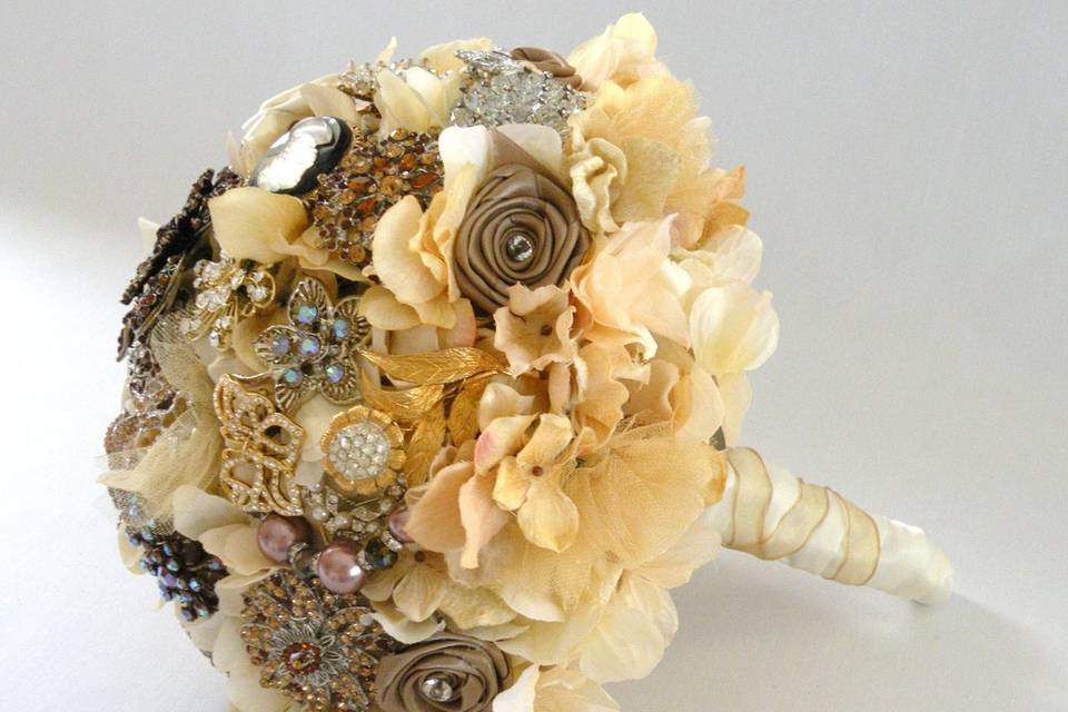 Glamourous brooch jeweled bouquet studded with rhinestone and crystal brooches, with silk hydrangea and satin ribbon roses. Shown here in topaz and gold but available in other colors