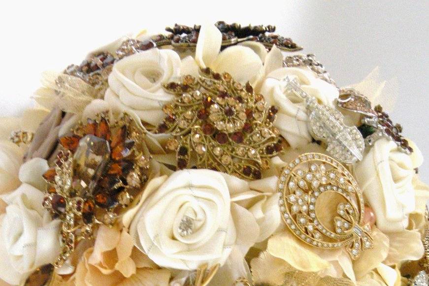 Glamourous brooch jeweled bouquet studded with rhinestone and crystal brooches, with silk hydrangea and satin ribbon roses. Shown here in topaz and gold but available in other colors