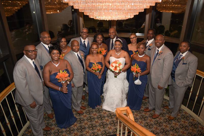 The couple with the bridesmaids and groomsmen