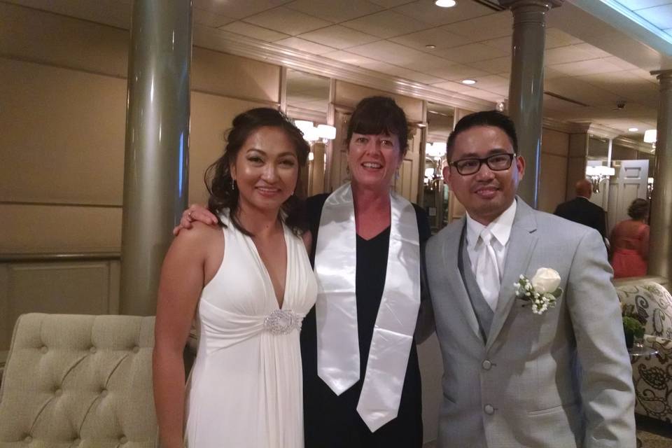 Couple with officiant