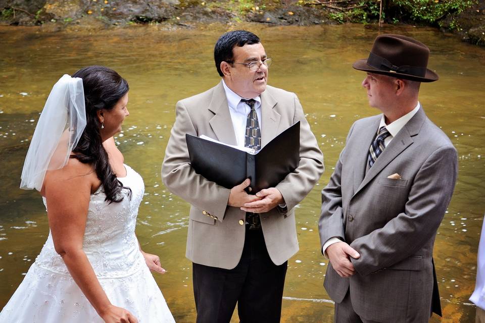 Couple with officiant