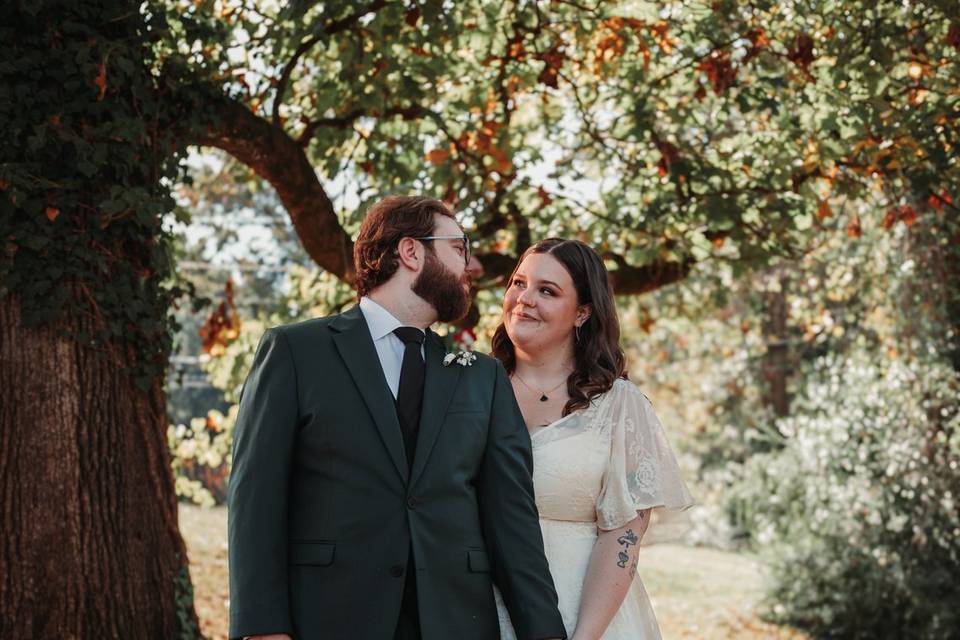 Bride and groom in tree area