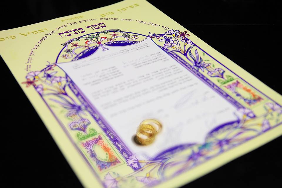 Marriage certificate and wedding bands