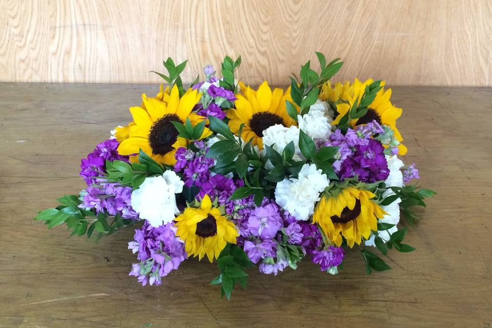 Violet and yellow flower arrangement