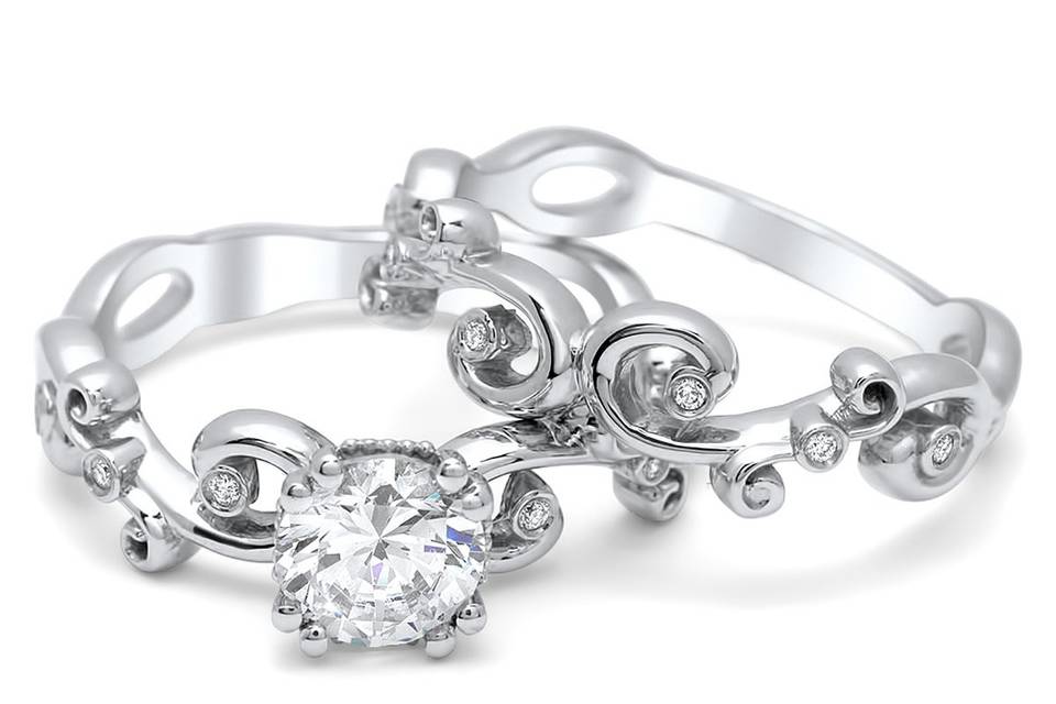 R1333, also known as the Allison Ring. As unique as you are. Featured in The Knot's Spring 2012 issue! Seen here with matching band.