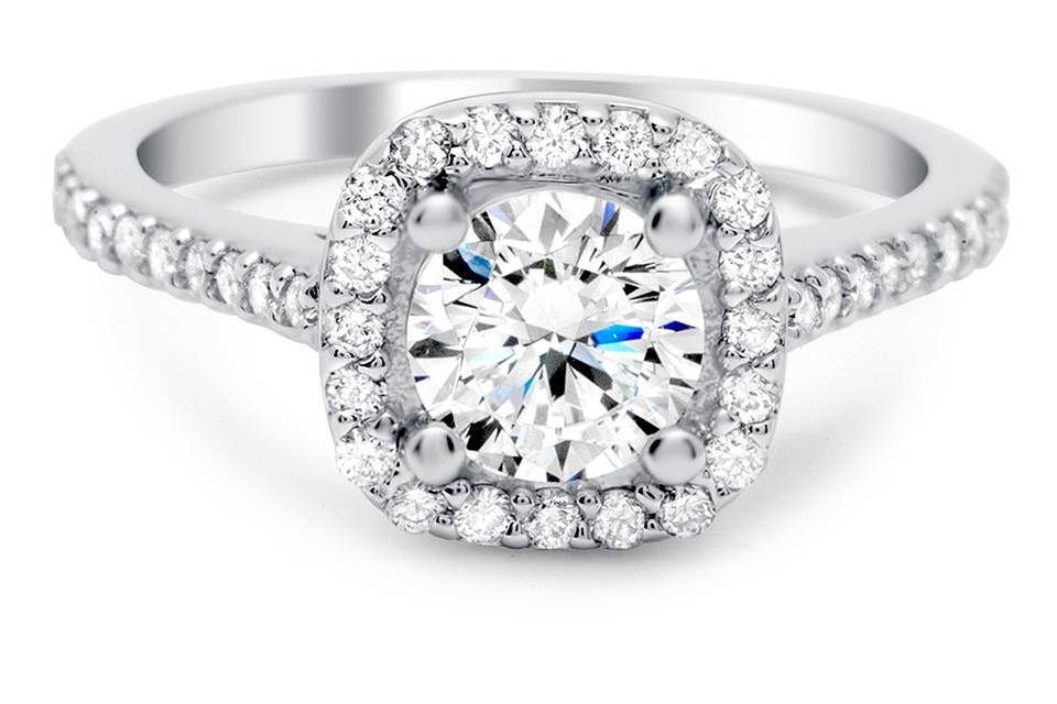 The best of both worlds: Cushion shaped diamond halo with a round diamond center.