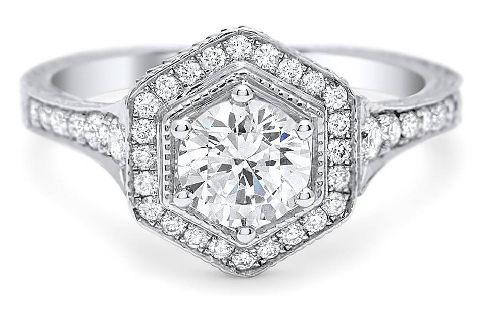Hexagon shaped halo and diamond covered tapered shank. Can fit your round center stone.