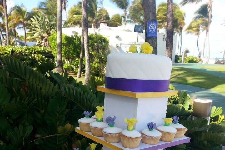 Tower of cake and cupcakes