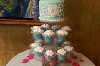 Tower of cake and cupcakes