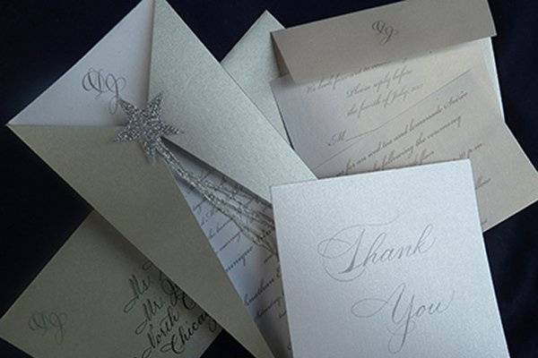 Silver invitation suite.  Handmade by Cartwheels, Louisville.  Calligraphy by Jan Hurst.