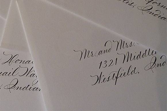 Invitation suite with color matched handlettered envelopes by Jan Hurst.