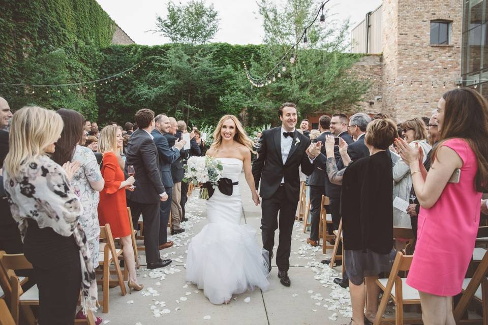 Couple walks down the aisle