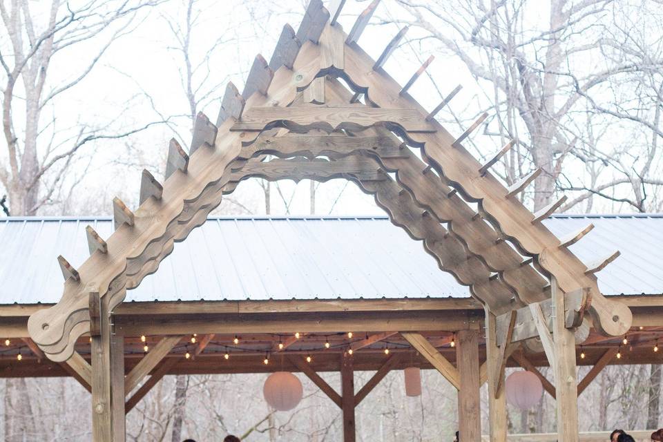 The massive arbor leading into the pavilion has incredible woodworking detail. A decorator's delight for bunting, candelabras or other creative ideas.