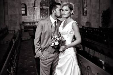 Newlyweds in chapel black and white