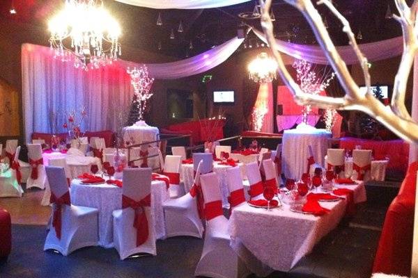 WEdding reception designed with crystal trees and elegant table linens to set the mood for this event