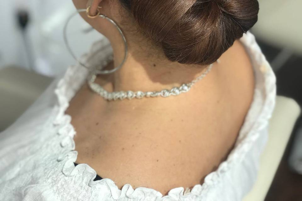 Smooth and silky updo by Breana