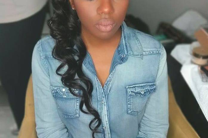 Curled side ponytail
