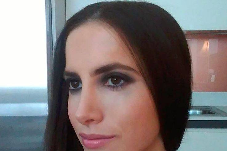 Straightened hair with middle part