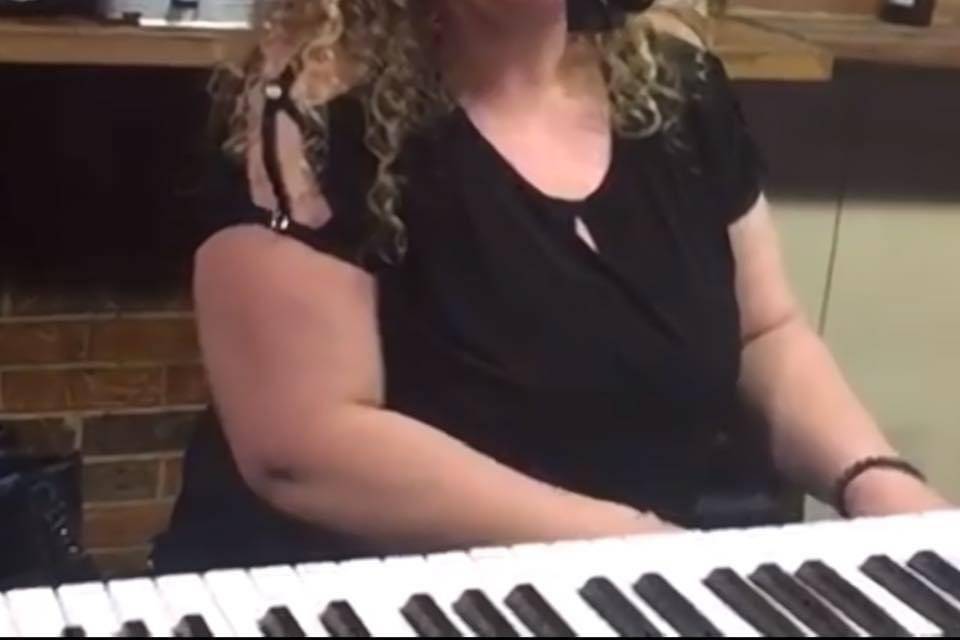 Amy on keys and vocals