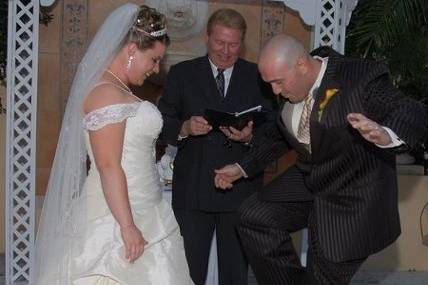 Ceremony under arch at beach