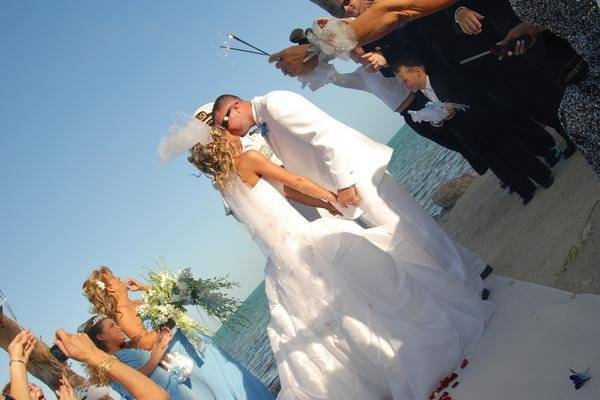 Newlyweds romantic walk along the beach