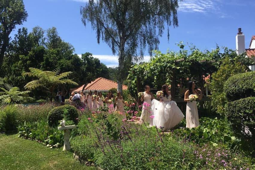 The bridal party makes their way to the ceremony at Rancho Soquel