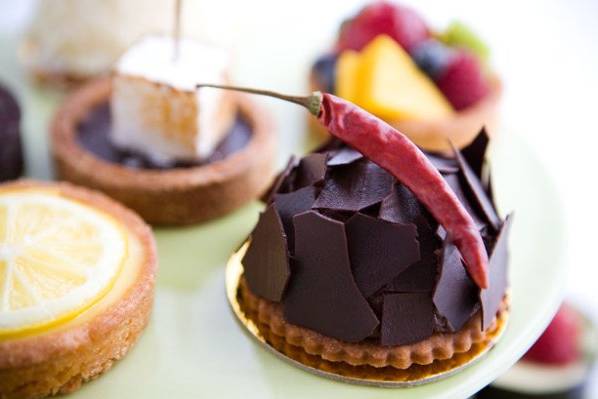 A variety of individual and bite sized desserts.