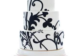 Fondant applique, pattern enlargeed from wedding invitation. Clara French cake stand.