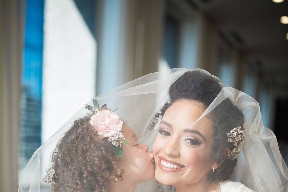 Natural hair updo, glowing bride makeup