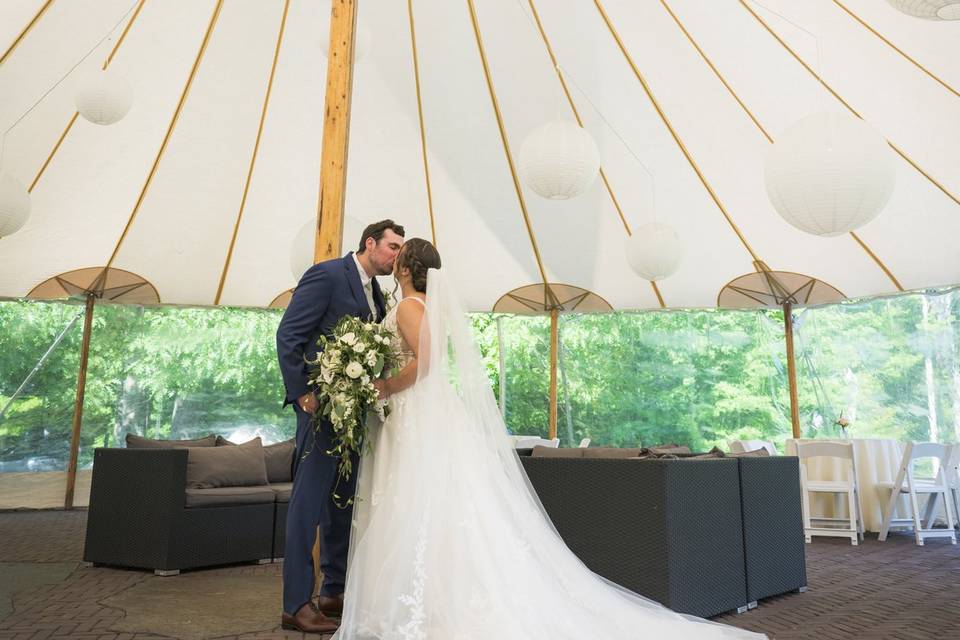 Quick kiss under the tent