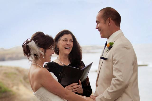 Denise De Luise officiating Katie & Justin's wedding, and sharing a funny moment.