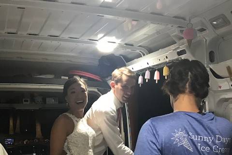 Newlyweds helping out in the truck