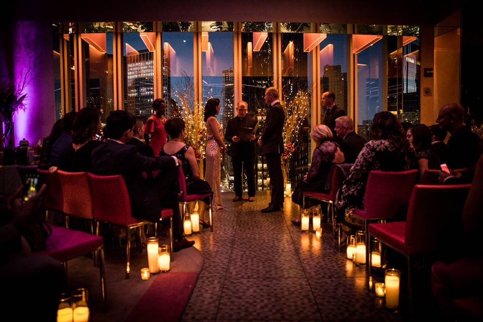 Ceremony in front of windows