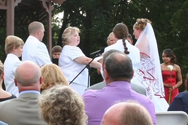 Kris & Paula, and Kristi & Mary in a double civil union ceremony in the tent at Bolingbrook Golf Club