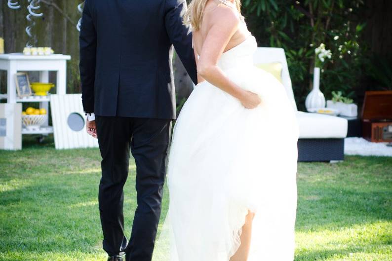 Yellow shoes, backyard wedding, lemons, black suit