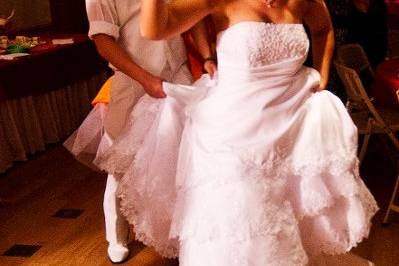 A happy bride leading the conga line!