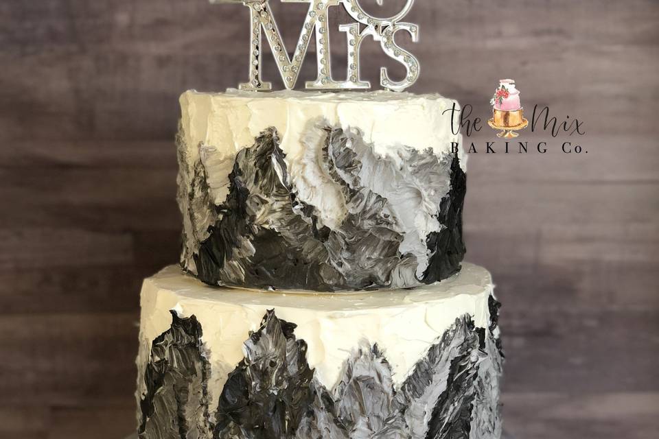 Painted buttercream mountain cake